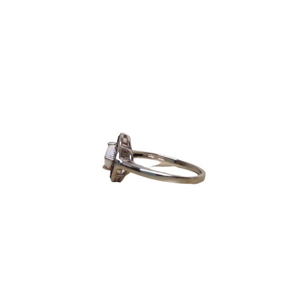 Sterling Silver Garnet Created White Opal Flower Ring - Picture 11 of 16